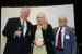 Professor T. Grandon Gill, Chair of the Award Ceremony, and Dr. Nagib Callaos, General Chair, giving Dr. Marta White, a plaque "In Appreciation for A Great Keynote Address at a Plenary Session."